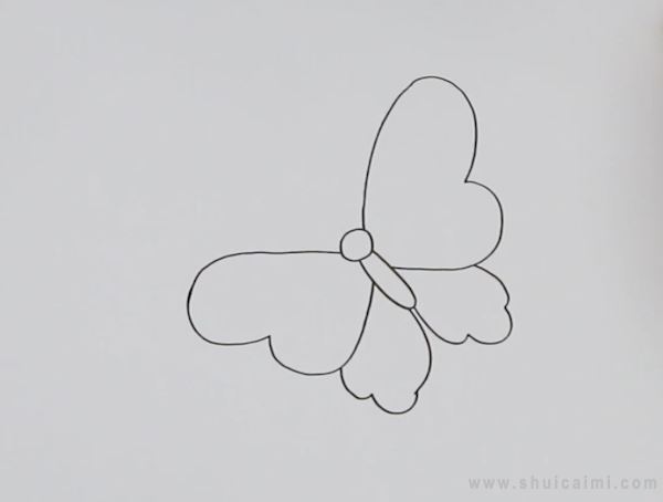 2,接着把蝴蝶头上画出触角,给翅膀画上漂亮的花纹